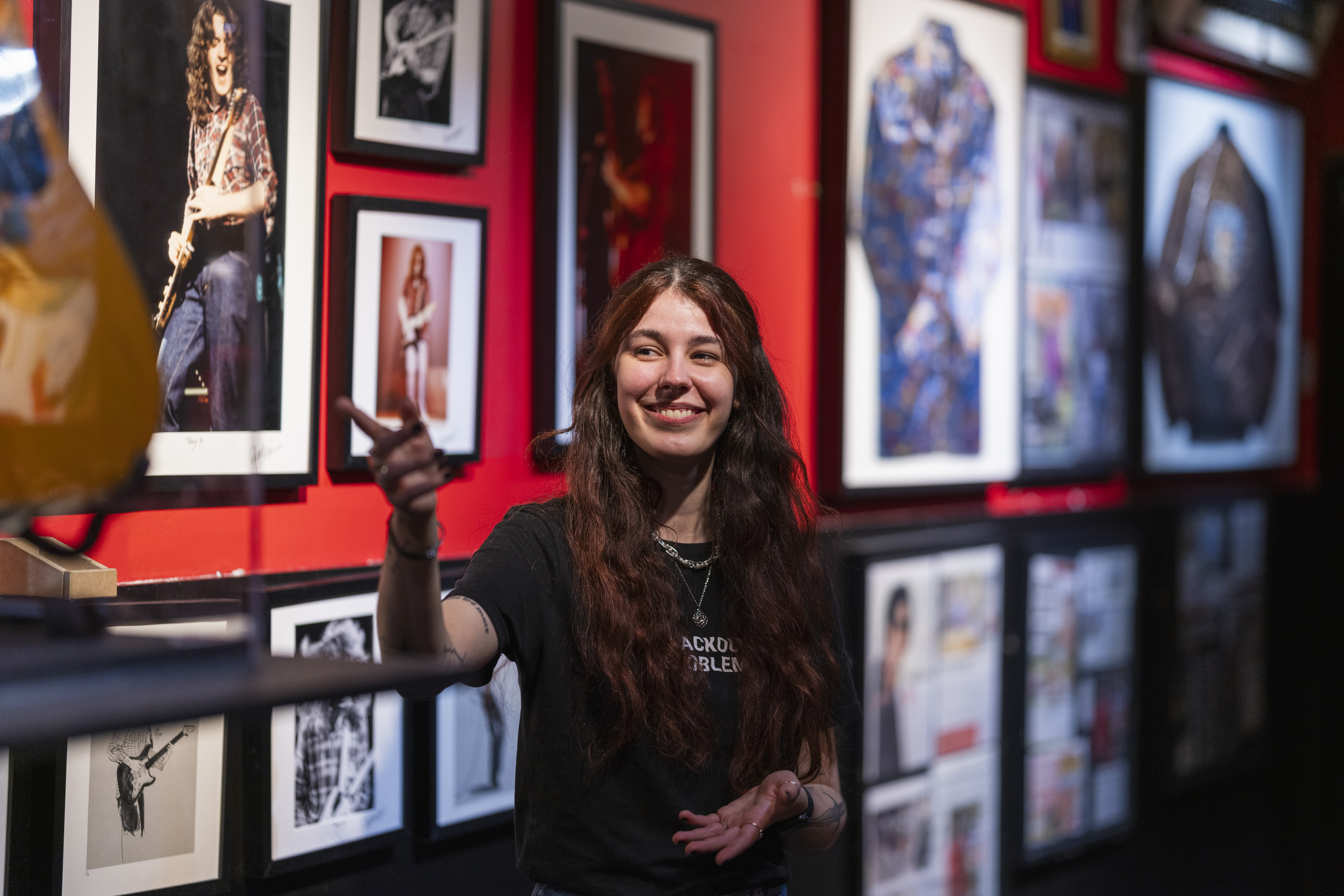 tour guide inside Rock 'n' Roll Museum giving a tour