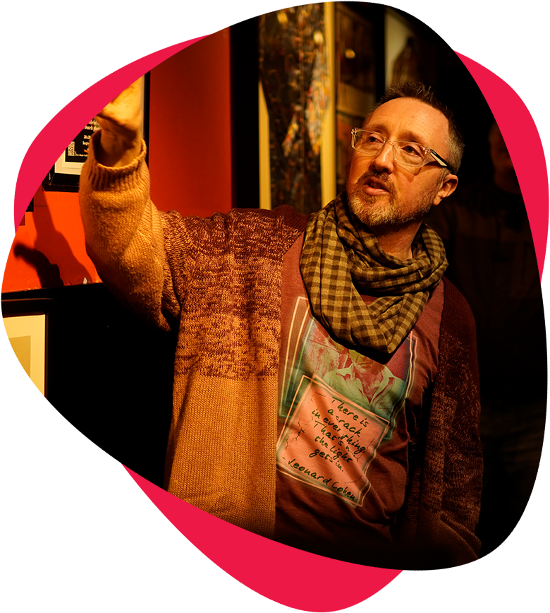 tour guide showing interior of Rock 'n' Roll museum